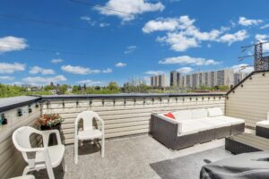 Private rooftop terrace at 380 Hopewell Ave #231 with space for outdoor dining, BBQ, and lounging—perfect for entertaining or relaxing in the sun.