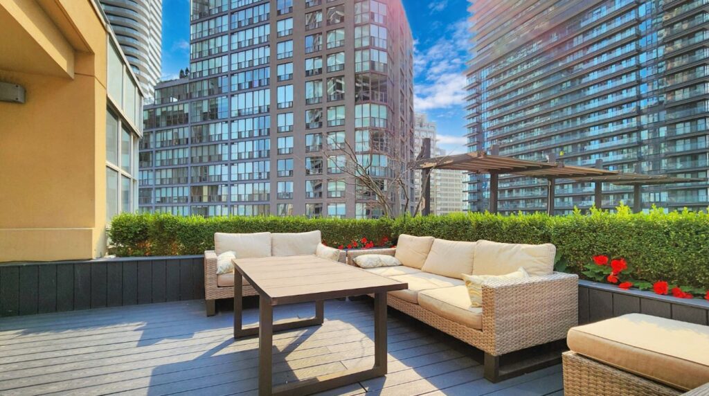 Rooftop seating lounge at Eleven Residences, 11 St Joseph St, featuring comfortable outdoor furniture and skyline views for residents to enjoy.