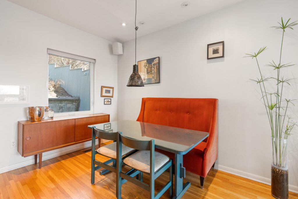 Dining area at 1370 Davenport Rd with room for a full-size table, hardwood floors, and open sightlines to the living room and kitchen.
