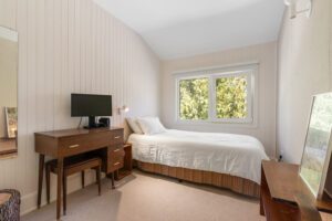 Third bedroom at 1370 Davenport Rd with view of the fully fenced backyard, large window, and versatile layout for office, nursery, or guest room.