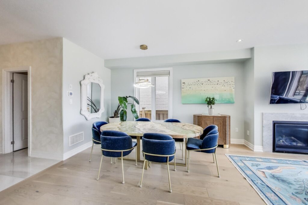 Dining room at 59 Maskells Cres-sunlit, open-concept space beside the kitchen