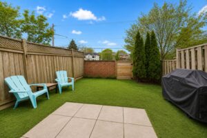 Private fenced backyard at 2108 Lakeshore Road West in South Oakville