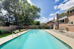 In-ground swimming pool and landscaped backyard at 22 Crossbow Crescent in Pleasant View, Toronto
