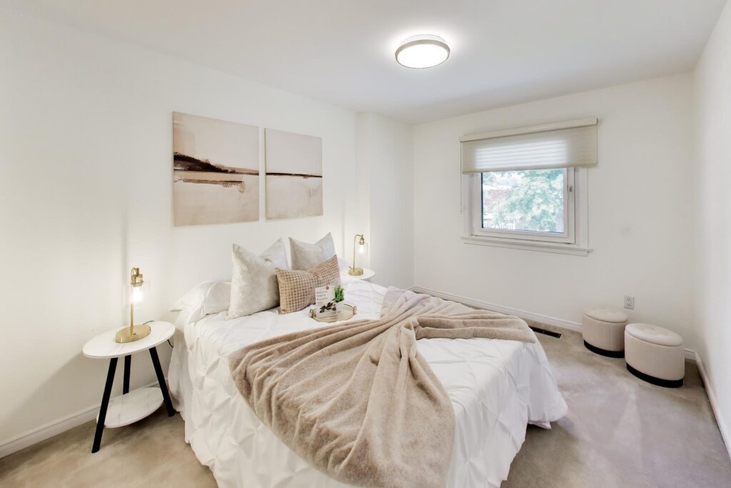 Bright second bedroom with window and closet at 22 Crossbow Crescent in Pleasant View, Toronto