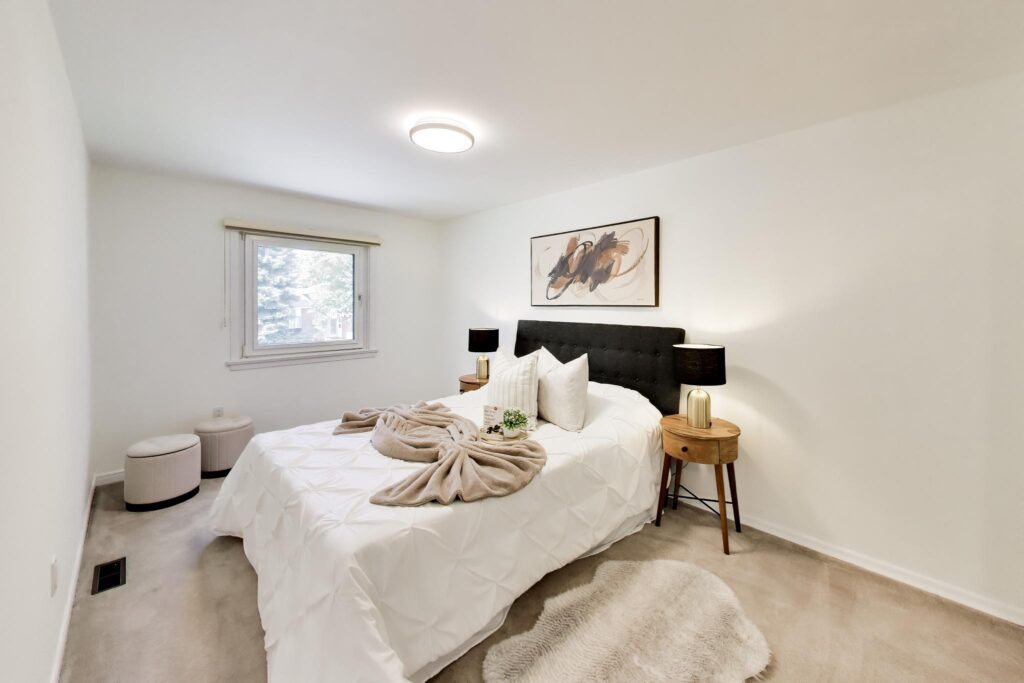 Third bedroom with large window and closet at 22 Crossbow Crescent in Pleasant View, Toronto