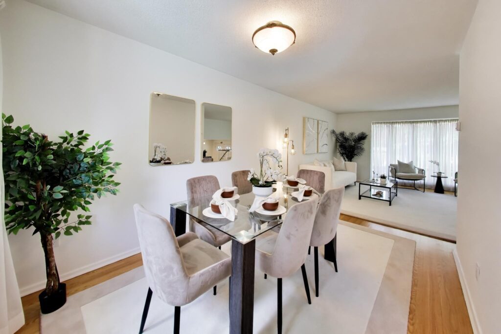 Dining room with seating for six and views toward the kitchen at 22 Crossbow Crescent in Pleasant View, Toronto