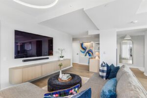 Bright living room with custom built-ins at 10 Graphophone Grove #702, Toronto